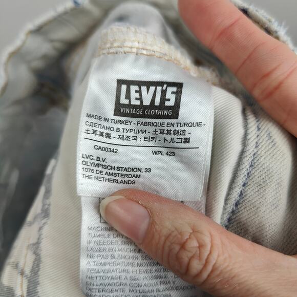 Levis Vintage Clothing Patchwork Jeans Womens 27 Light Wash Moon Tapered - Picture 10 of 13